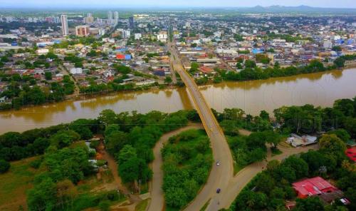 an aerial view of a bridge over a river at CIC Apartamento amoblado Mirador del Sinú in Montería