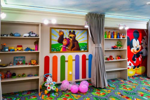 a childs room with a playroom with toys at Tsarevets Boutique Hotel & SPA in Veliko Tŭrnovo