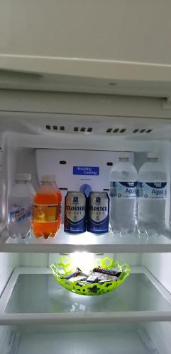 a refrigerator filled with lots of food and drinks at Casa Palagui Colonial in Valladolid