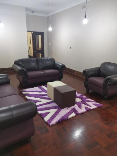 Zona de estar de 180 On Anderson Guest House
