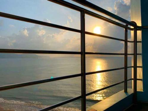 a view of the ocean from a ship window at Seagull Hotel in Quy Nhon