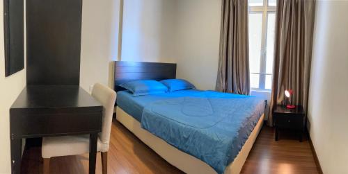 Krevet ili kreveti u jedinici u okviru objekta Homestay 3 rooms suite Apartment 8-10pax at Amari Villa Bukit Katil, Ayer Keroh Melaka