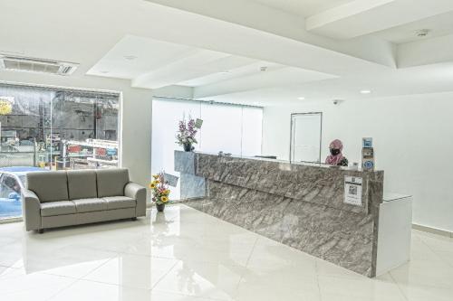 a lobby of a store with a reception counter at Grand Bagan Hotel in Butterworth