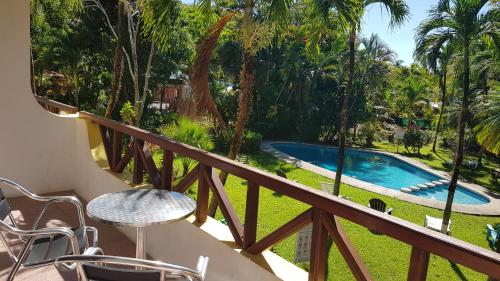 a balcony with a view of a swimming pool at Samara Beach Hotel in Sámara