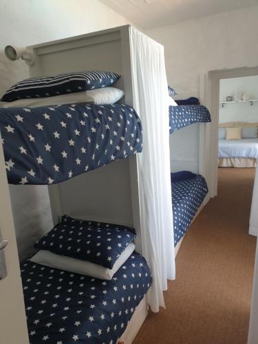 Ένα ή περισσότερα κρεβάτια σε δωμάτιο στο 59 LongSantos