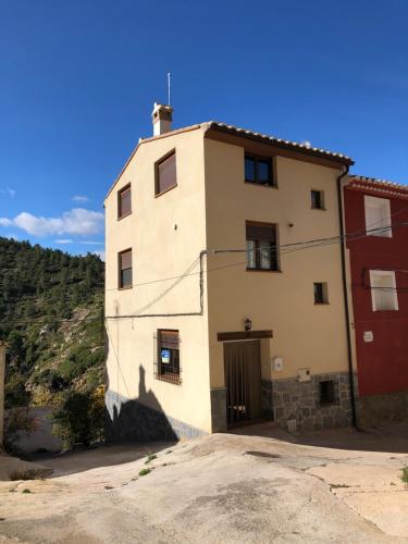 a large white building sitting on top of a hill at CASA RURAL FUENTE LA REINA Ref 045 in Fuente la Reina