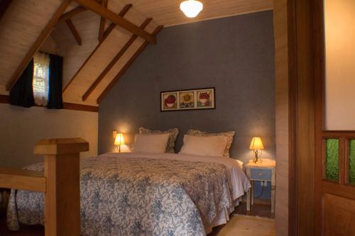 Cama o camas de una habitación en Pousada Villa Rhústica