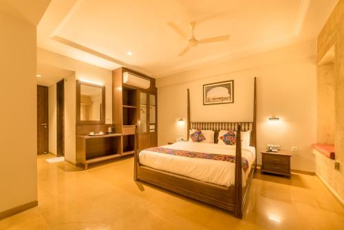 Una cama o camas en una habitación de Hotel Antra Inn
