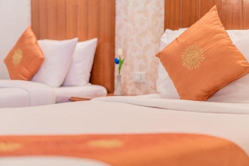 Postel nebo postele na pokoji v ubytování Phi Phi Anita Resort