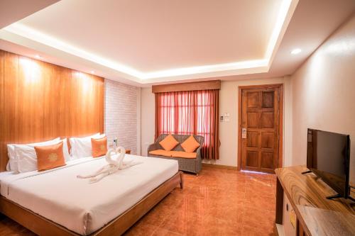 Postel nebo postele na pokoji v ubytování Phi Phi Anita Resort