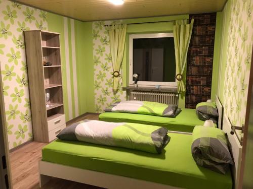 Tempat tidur dalam kamar di Biker's Base Baddeckenstedt