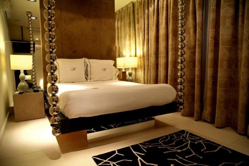 Krevet ili kreveti u jedinici u okviru objekta Abalú Small Luxury & Design Boutique Hotel