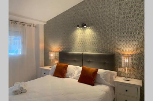 Una cama o camas en una habitación de Atico en Marbella centro, segunda linea playa 731