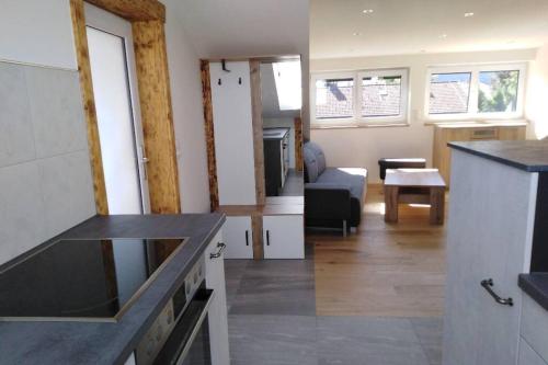 Η κουζίνα ή μικρή κουζίνα στο Komplette Dachwohnung mit Balkon und Bergblick