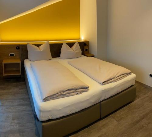 Ένα ή περισσότερα κρεβάτια σε δωμάτιο στο Haus Schönblick