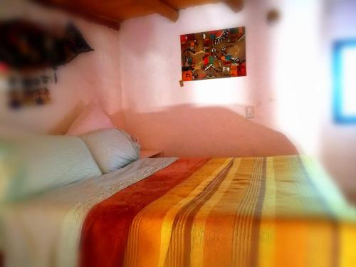 Cama o camas de una habitación en Cabañas Paqa Paqa