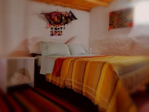 Cama o camas de una habitación en Cabañas Paqa Paqa