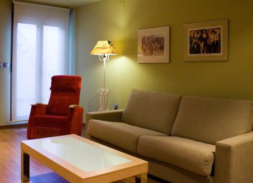Un lugar para sentarse en Hospedium Apartamentos Cañitas Maite Familiar