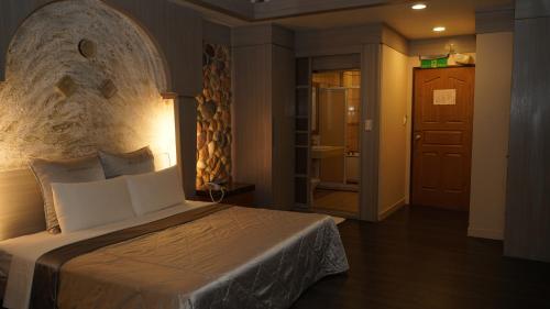 Wind Coast Motelにあるベッド