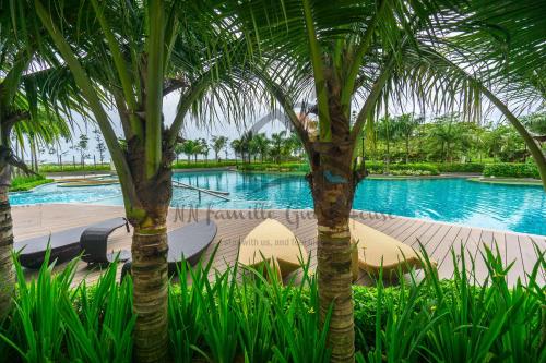 The swimming pool at or close to NN Famille Guest House