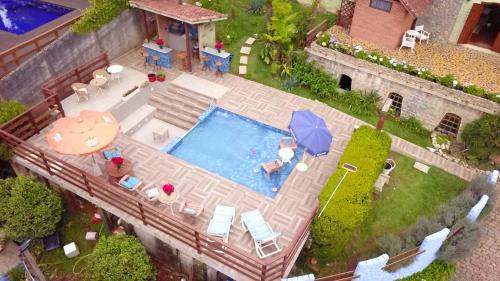 Πισίνα στο ή κοντά στο Hortensias Pousada Boutique - Piscina Aquecida 37 Graus e Fire Pit a Gas - Aceita PET