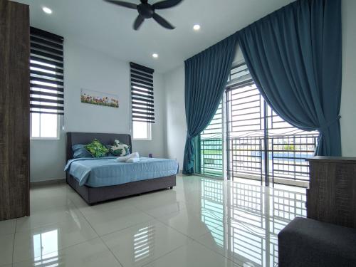 Photo de la galerie de l'établissement Desaru Comfy Home with Netflix Near Beach, Waterpark & BBQ, à Bandar Penawar