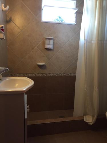 Koupelna v ubytování Hotel Gloria