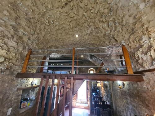 an overhead view of a staircase in a stone wall at Pyrgos 1869 with Private Pool in Gythio
