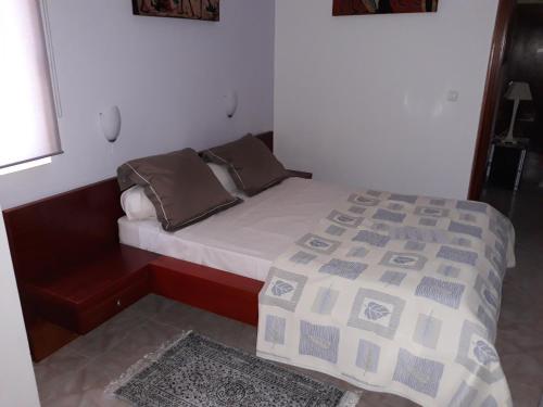 Postel nebo postele na pokoji v ubytování Yria Residencial