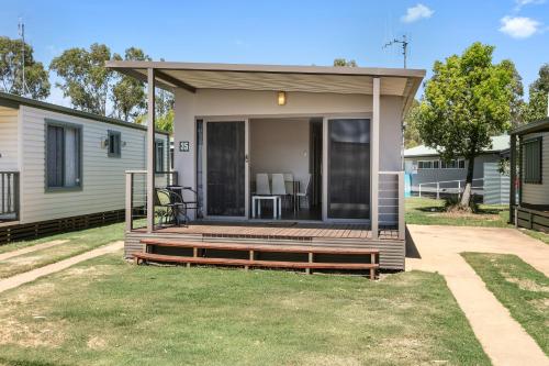 a mobile home with a porch and a deck at BIG4 Moama Holiday Park in Moama