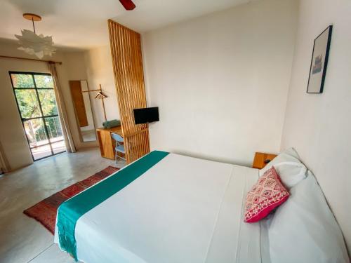 TV a/nebo společenská místnost v ubytování Azul Cielo Hostel