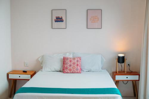 Ένα ή περισσότερα κρεβάτια σε δωμάτιο στο Azul Cielo Hostel