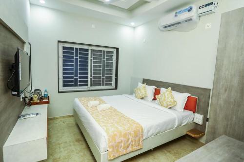 Voodi või voodid majutusasutuse Classio Residency toas