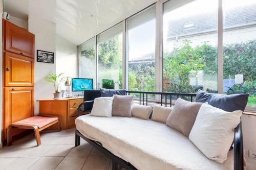 Photo de la galerie de l'établissement Maison charmante à Gravelines avec jardin et vélos disponibles, à Gravelines