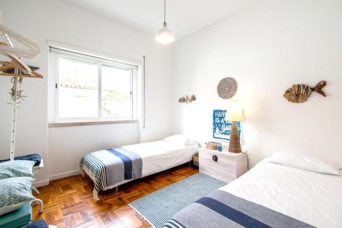 Кровать или кровати в номере 2 bedrooms appartement with wifi at Cascais