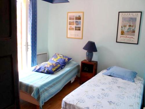 Villa de 3 chambres avec piscine privee jardin clos et wifi a Eyragues tesisinde bir odada yatak veya yataklar