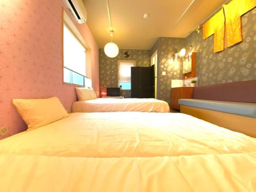 Katil atau katil-katil dalam bilik di Hostel Kay 101&102