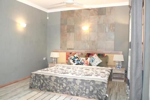 Una cama o camas en una habitación de Charming Studio in Blue Bay, 22 m², Near Beaches