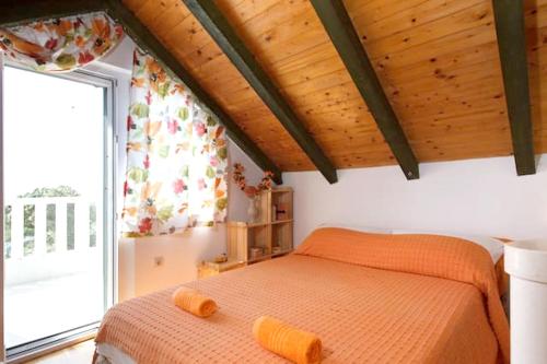 Postel nebo postele na pokoji v ubytování Charming Villa in Pučišća + Pool