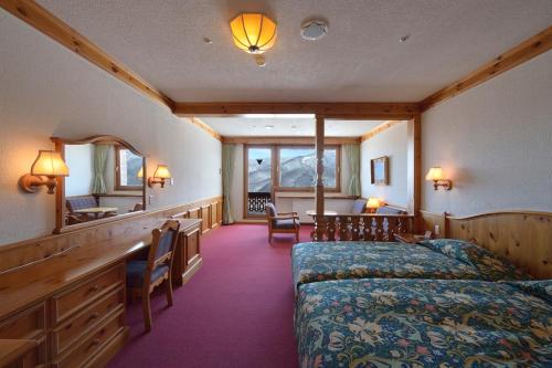 Χώρος καθιστικού στο Hotel Grand Phenix Okushiga