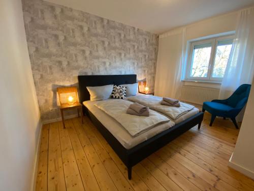 Säng eller sängar i ett rum på Ferienhaus Chemnitz