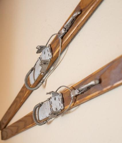 a pair of horse bridles hanging on a wall at Haus Salina in Ellmau