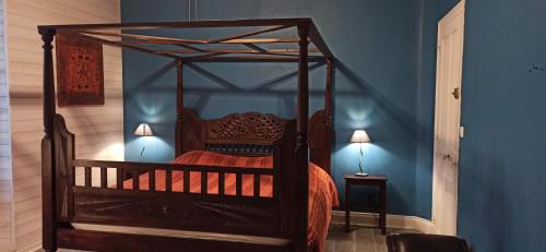 Ένα ή περισσότερα κρεβάτια σε δωμάτιο στο Chambre d'hôtes Park des Collines - Gîte