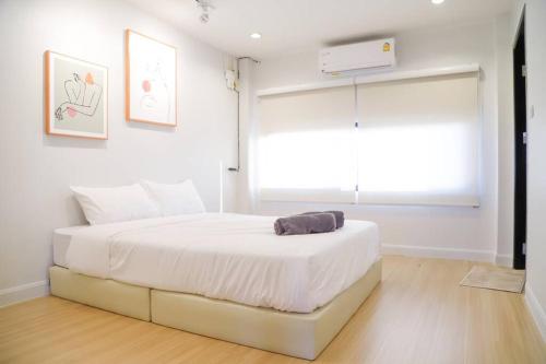 Postel nebo postele na pokoji v ubytování Brand-new Aewmai Pool Villa&Promotion◆byน้องมังคุด