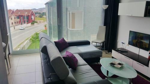 Posedenie v ubytovaní Charming Apartment in Riveira with Private Parking