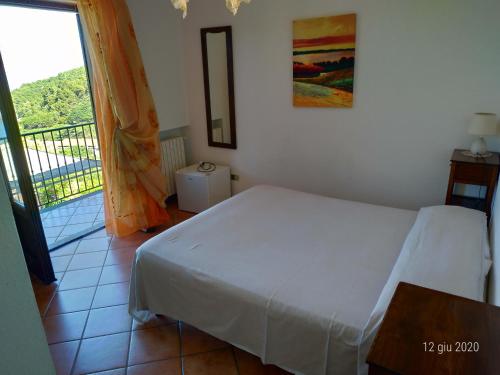 Postel nebo postele na pokoji v ubytování Bed & Breakfast Laino