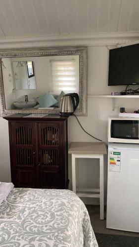 Ένα ή περισσότερα κρεβάτια σε δωμάτιο στο White River B & B