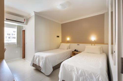 Cama o camas de una habitación en Miramar Hotel