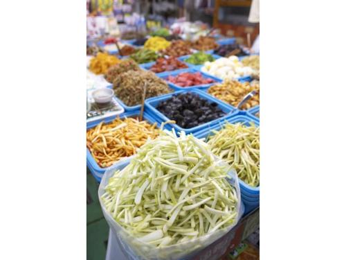a display of dried fruits and vegetables at a market at Hotel Kokusai Plaza - Vacation STAY 09920v in Naha