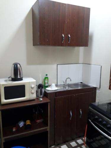 Virtuvė arba virtuvėlė apgyvendinimo įstaigoje FOA Residence